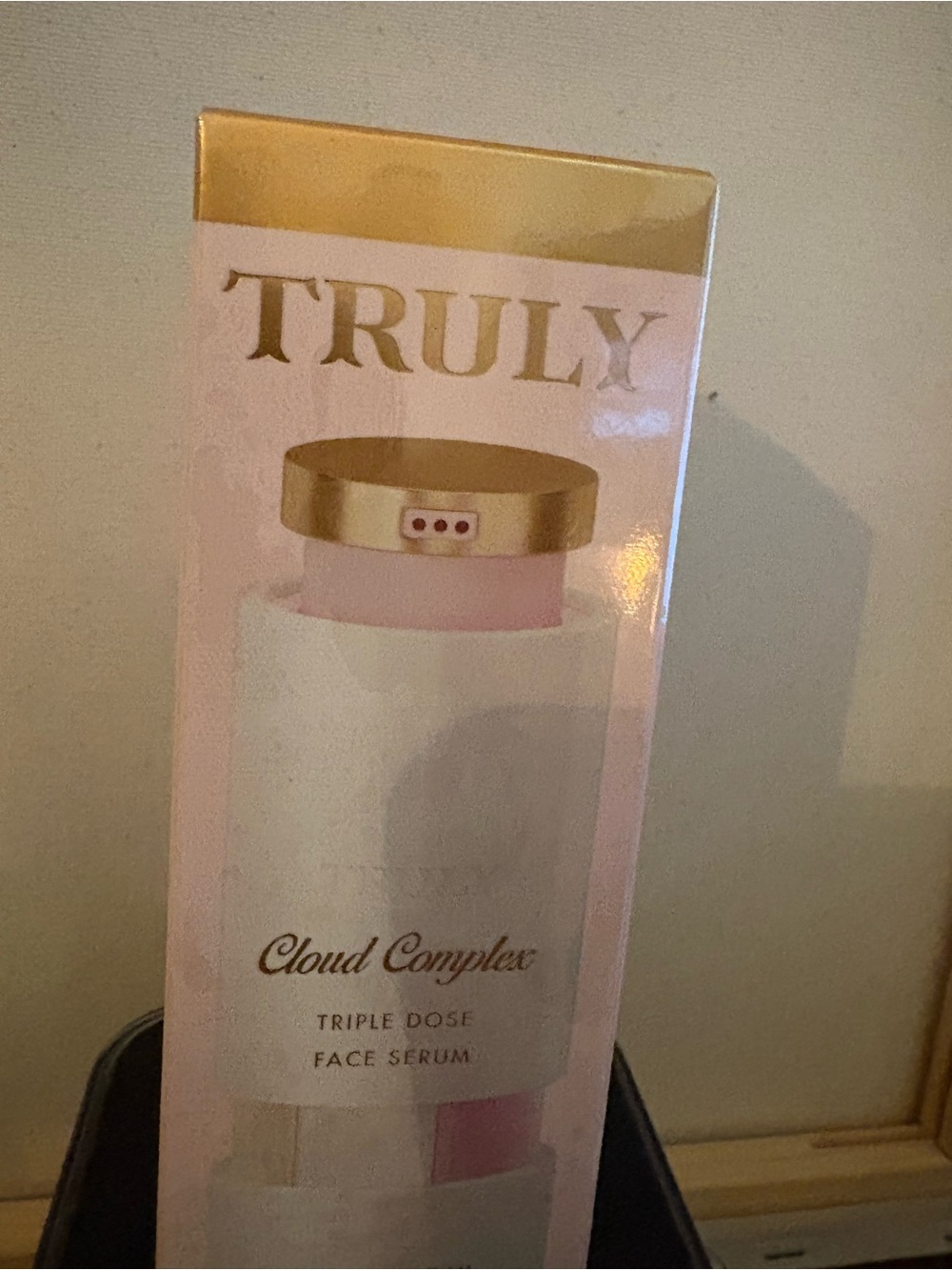TRULY Face Serum Bottle in Pink & Gold Packaging